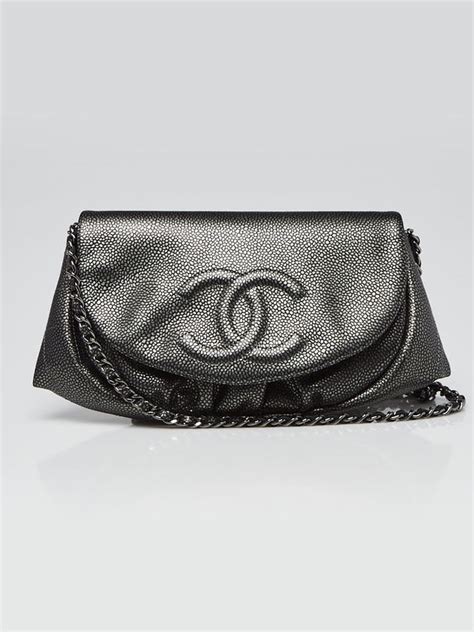 Chanel caviar WOC half moon clutch with silver hardware.